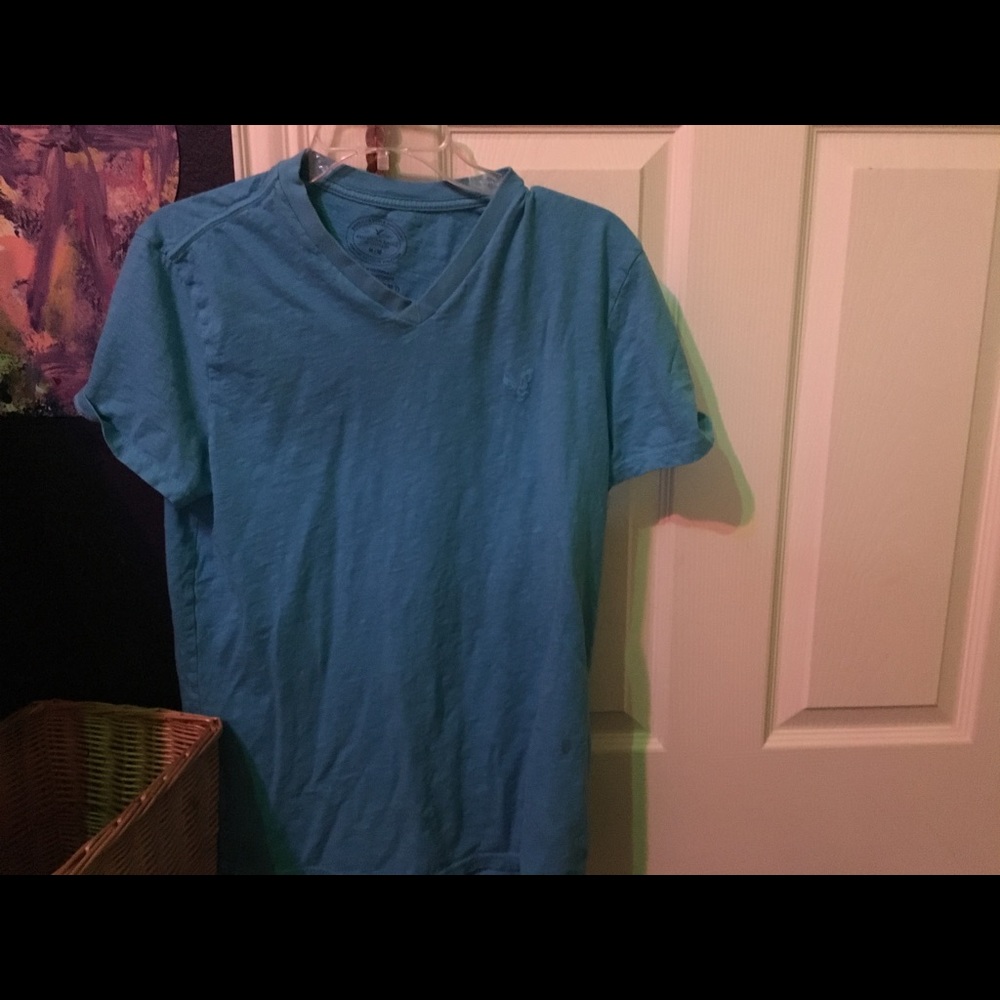 )SOLD(   AE v neck shirt in super blue size M
